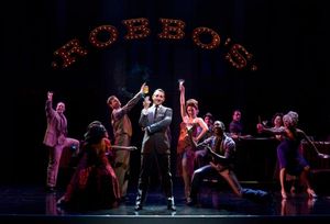 Eric Schneider (center, as Robbo Ortona) and the cast  Photo