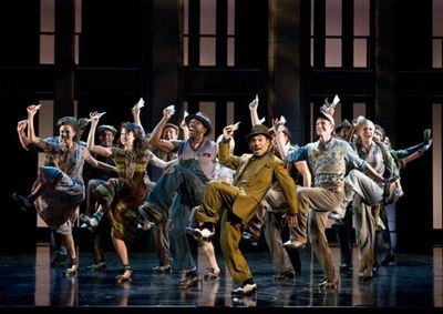 Jeffrey Schecter (center, as Willie Scarlatti) and the cast  Photo
