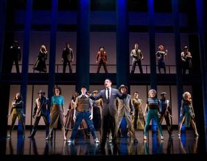 Eric Schneider (center, as Robbo Ortona) and the cast Photo