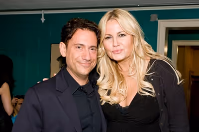 Eugene Pack and Jennifer Coolidge Photo