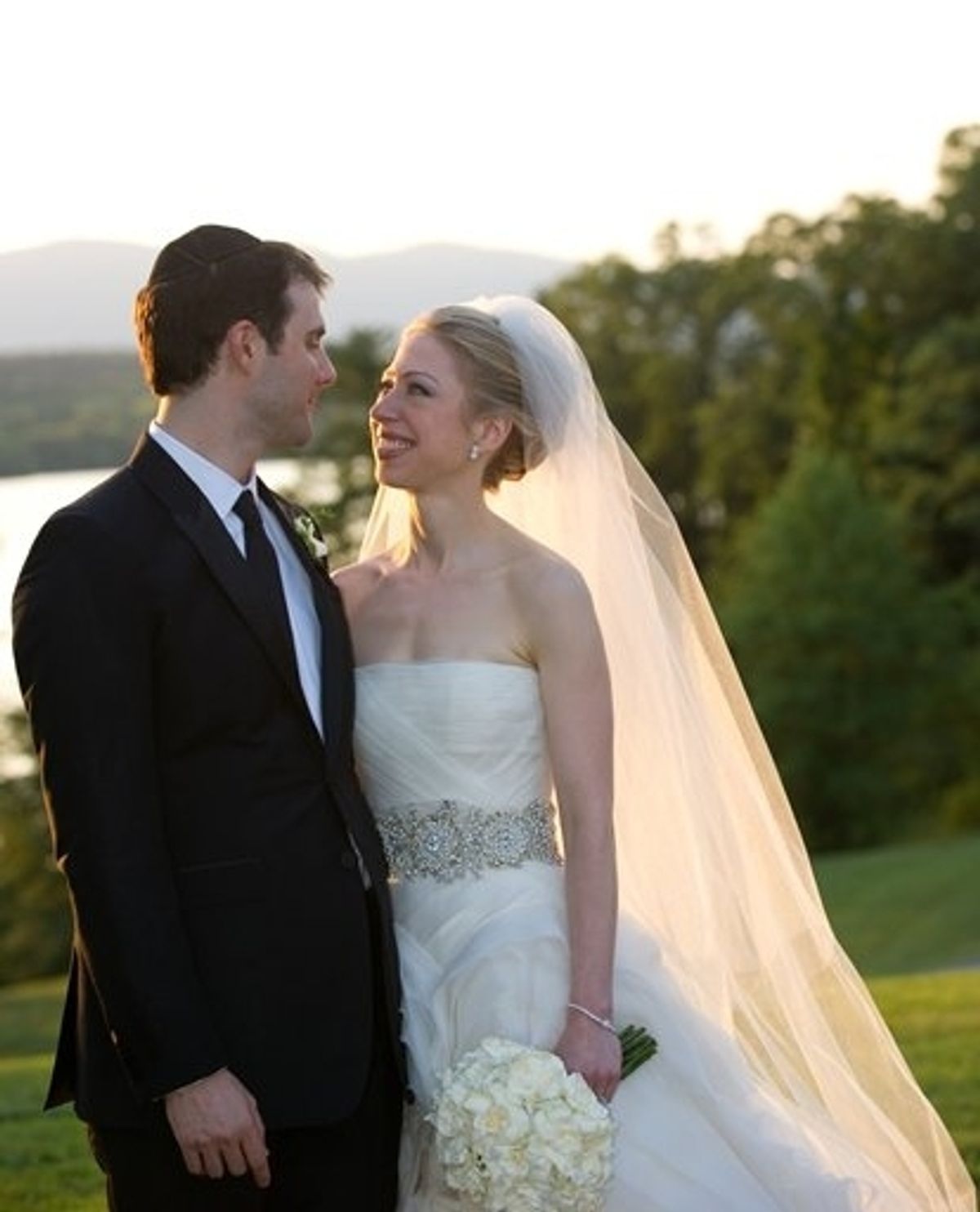 Marc Mezvinsky (L) and Chelsea Clinton at 