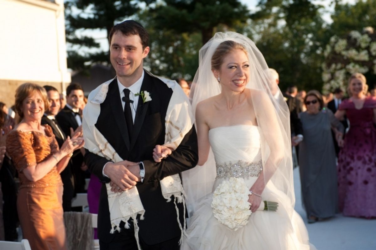 Marc Mezvinsky (L) and Chelsea Clinton at 