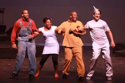 Tituss Burgess and Nicholas Rodriguez with BDF Students Photo