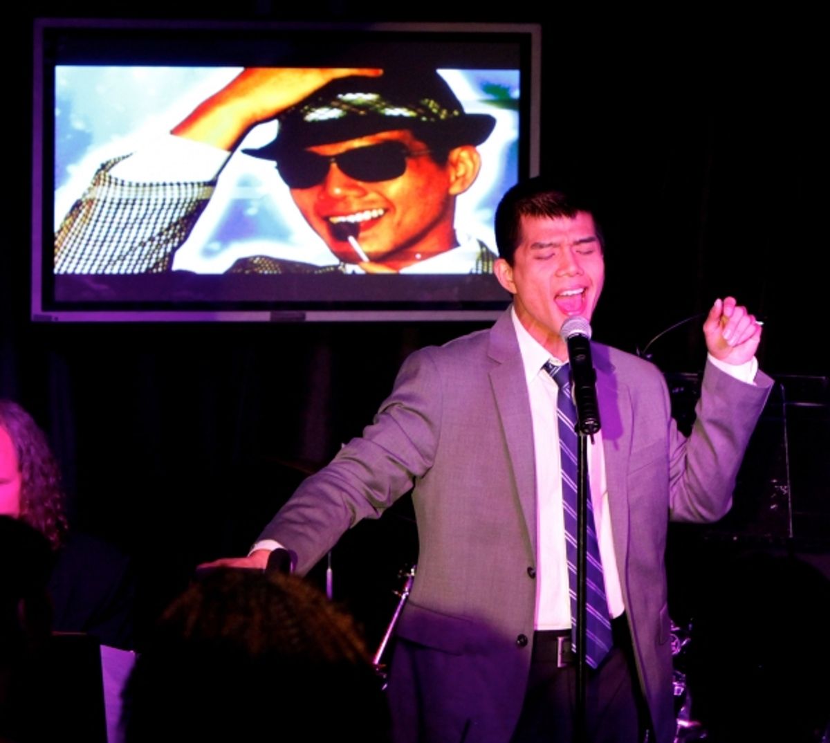 Telly Leung on stage at 