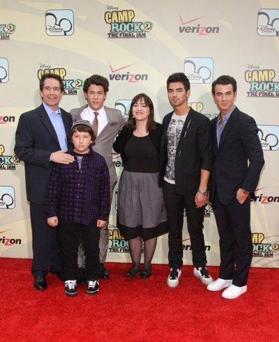 Kevin, Nick and Joe of The Jonas Brothers, along with Gary Marsh, Carolina Lightcap ( Photo