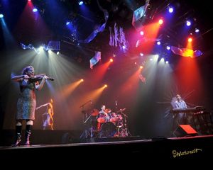 Sara K. Story, Vaughn Irving, and Steve Przybylski, and behind the scrim, Heather Rei Photo