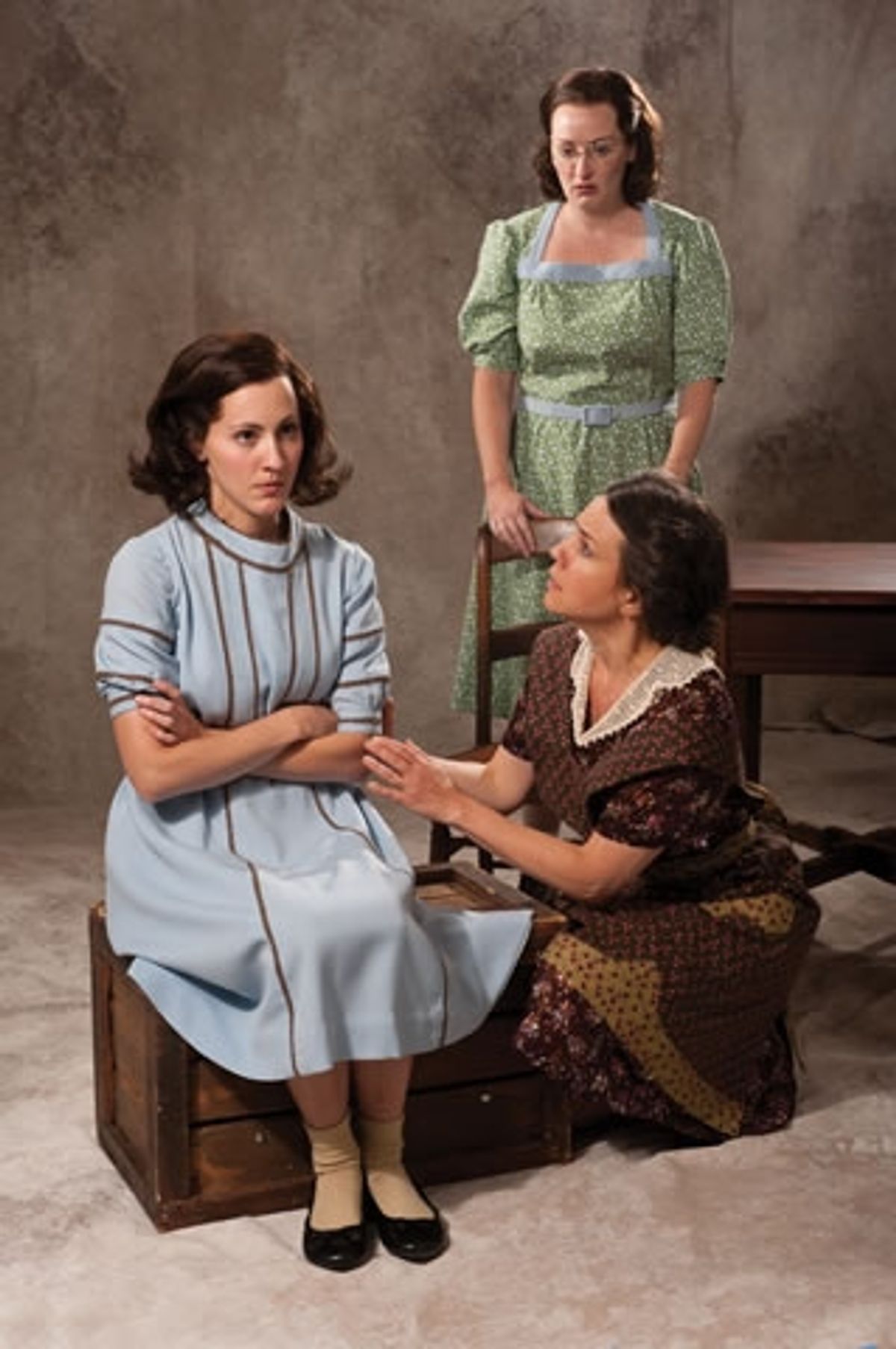 Mariko Nakasone (left) as Anne Frank, Rebecca Prescott as Margot Frank, and Corliss Preston as Edith Frank at 