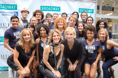 Judy McLane, Heidi Godt and Stacia Fernandez and the cast of Mamma Mia Photo
