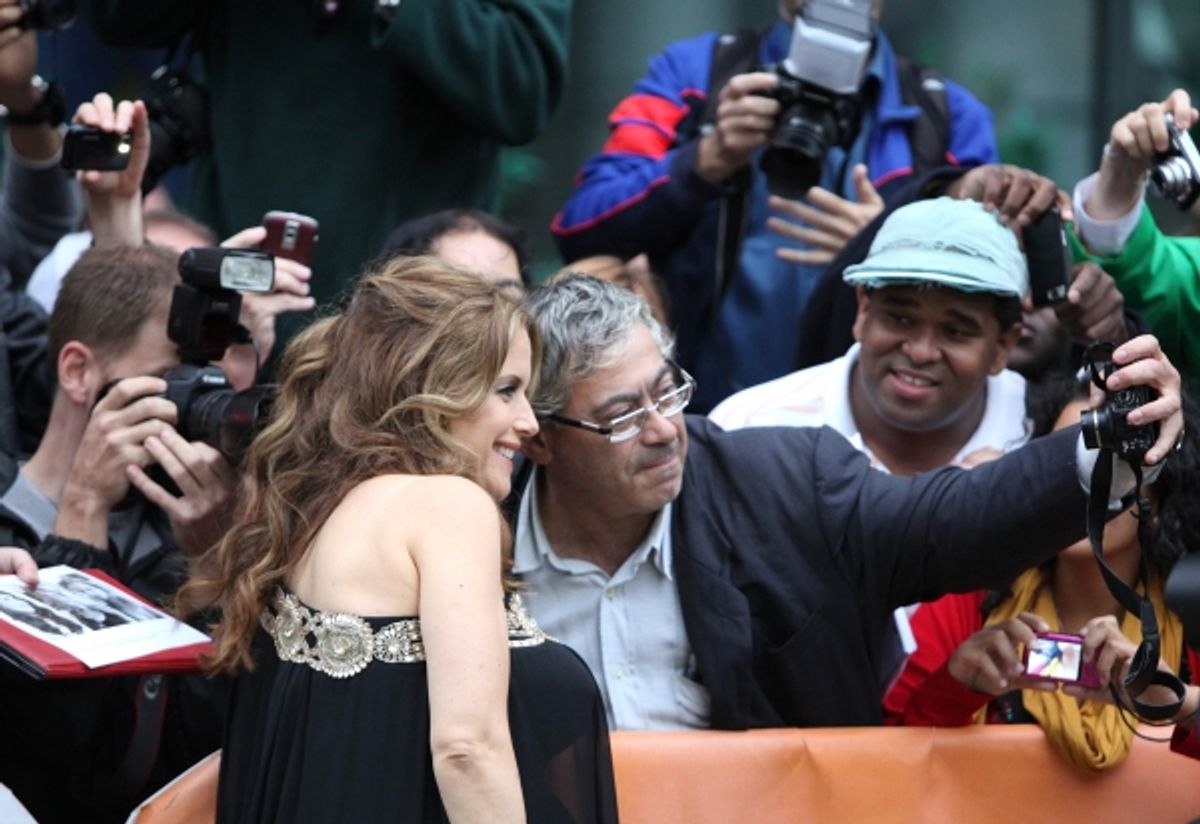 Kelly Preston and fans at 