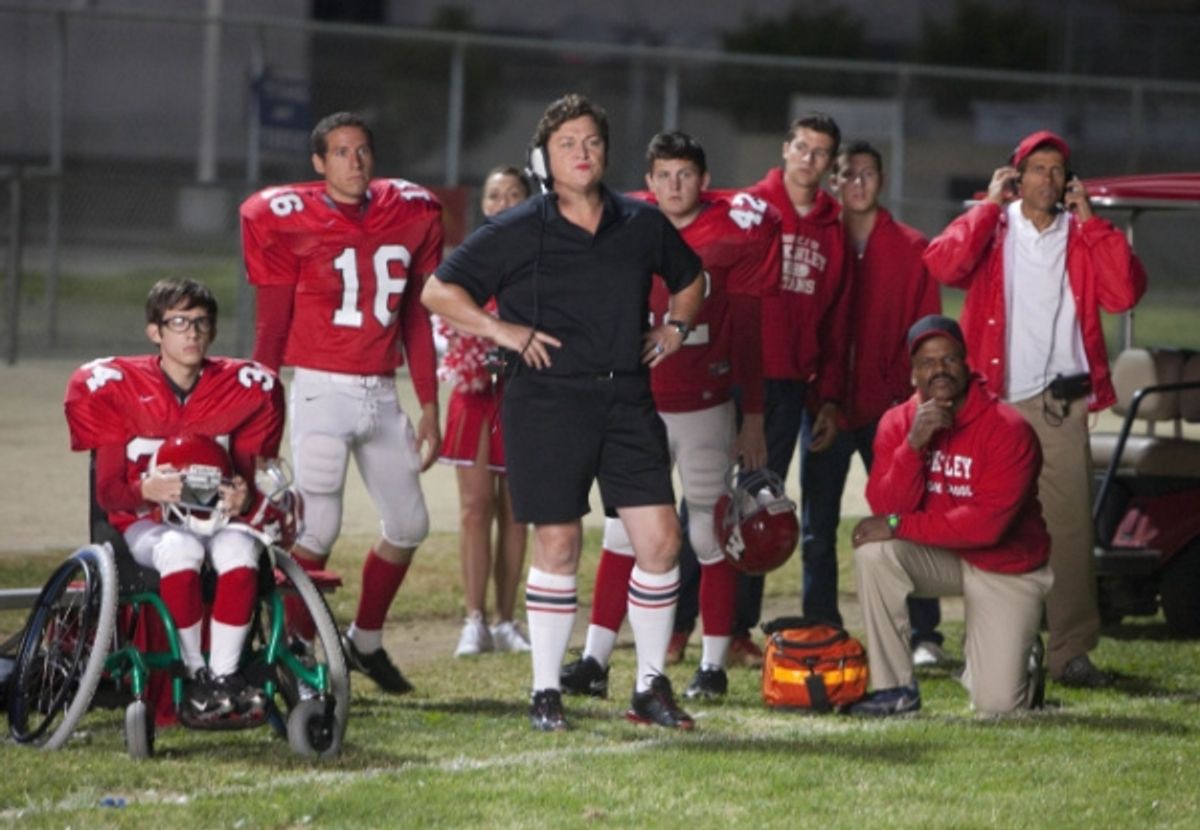 Coach Beiste (guest star Dot Marie Jones, C) and the football team at 
