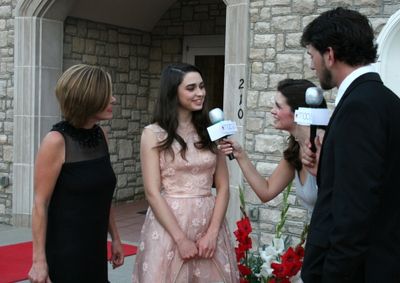 Rosemary Fossee and her mother talk with Jennifer and Trey. Photo