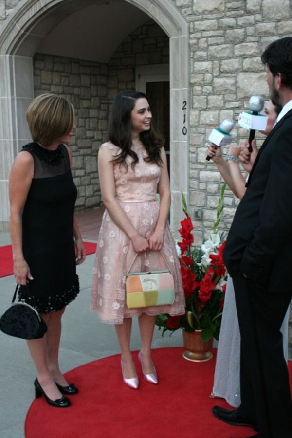 Rosemary Fossee and her mother talk with Jennifer and Trey. Photo
