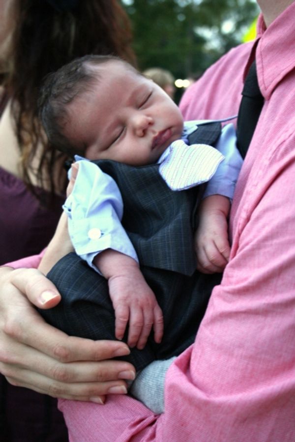 Two-week-old Phin Lowder rocks the red carpet in his first suit. Photo