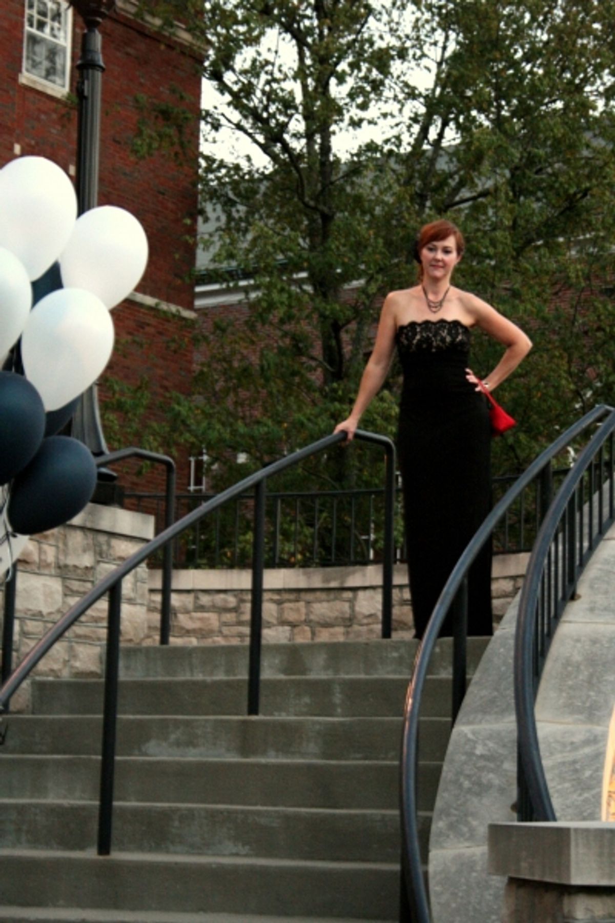 Corrie Miller strikes a pose on the staircase. at 