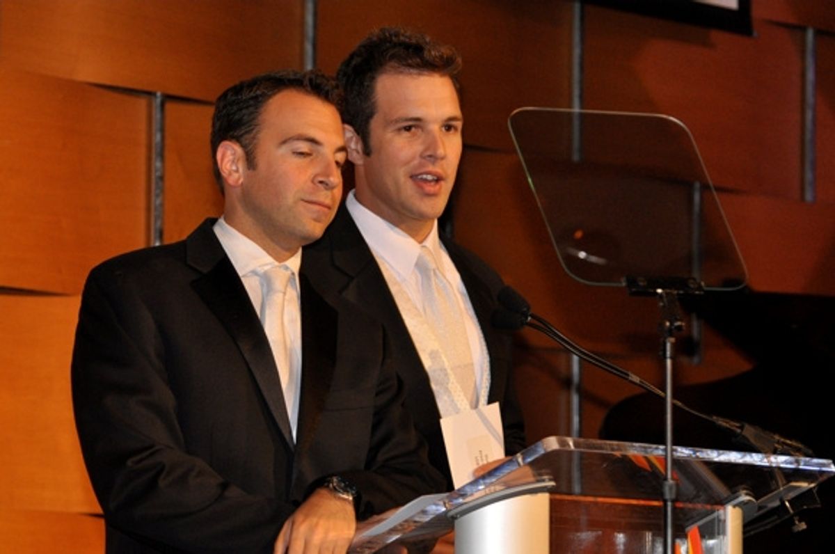 Daniel Robinson and Anthony Wilkinson present the award for Outstanding Print Campaign LGBT Market and Mainstream Market at 