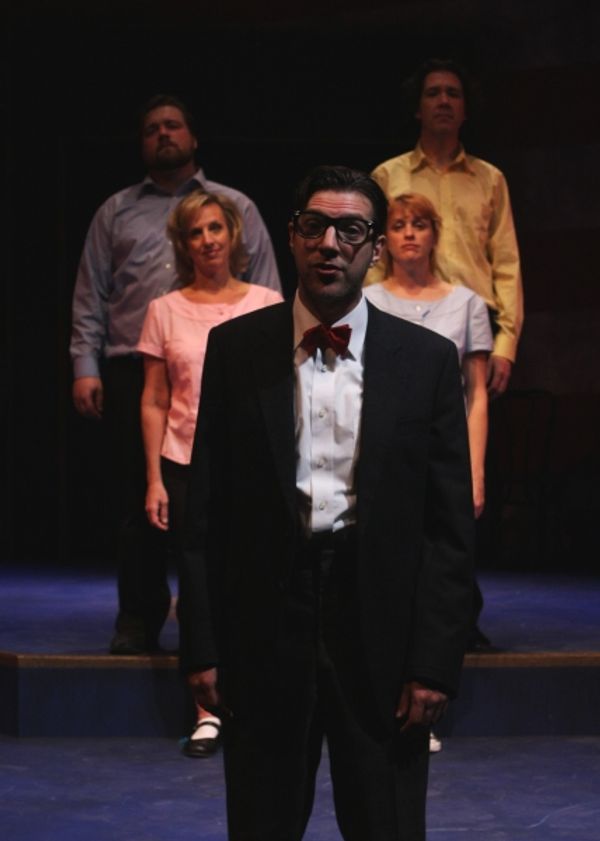 Dudley (Joseph Scrimshaw) stands with the ensemble (l to r: Matt Erkel, Paul de Cordo Photo