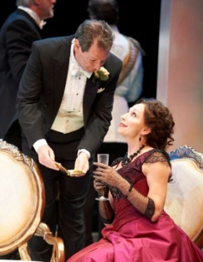 Robert Chiltern (actor, Richard Klautsch) and Mrs. Cheveley (actor Laura Perrotta)  Photo
