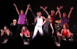 Ron Dennis with the A CHORUS LINE ensemble Photo