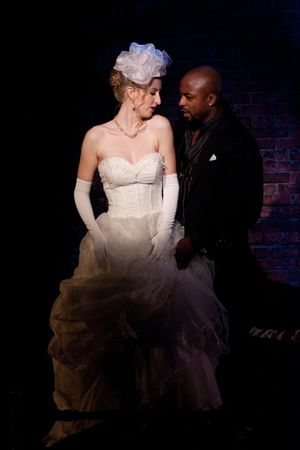 Victoria Frings as Polly Peachum and Terence Archie as MacHeath Photo