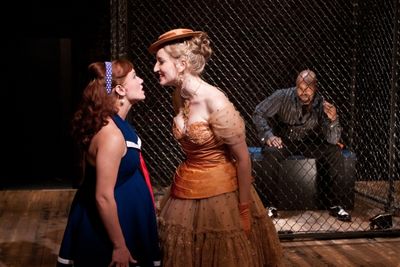 (L-R) Liz Filios as Lucy, Victoria Frings as Polly Peachum and Terence Archie as MacH Photo