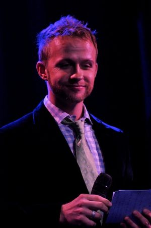 Marty Thomas kicks off the live auction Photo