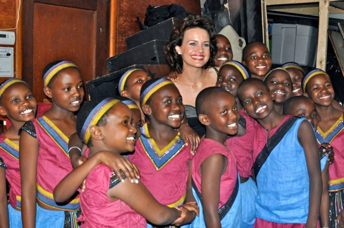 Carla Gugino and The African Children's Choir at 
