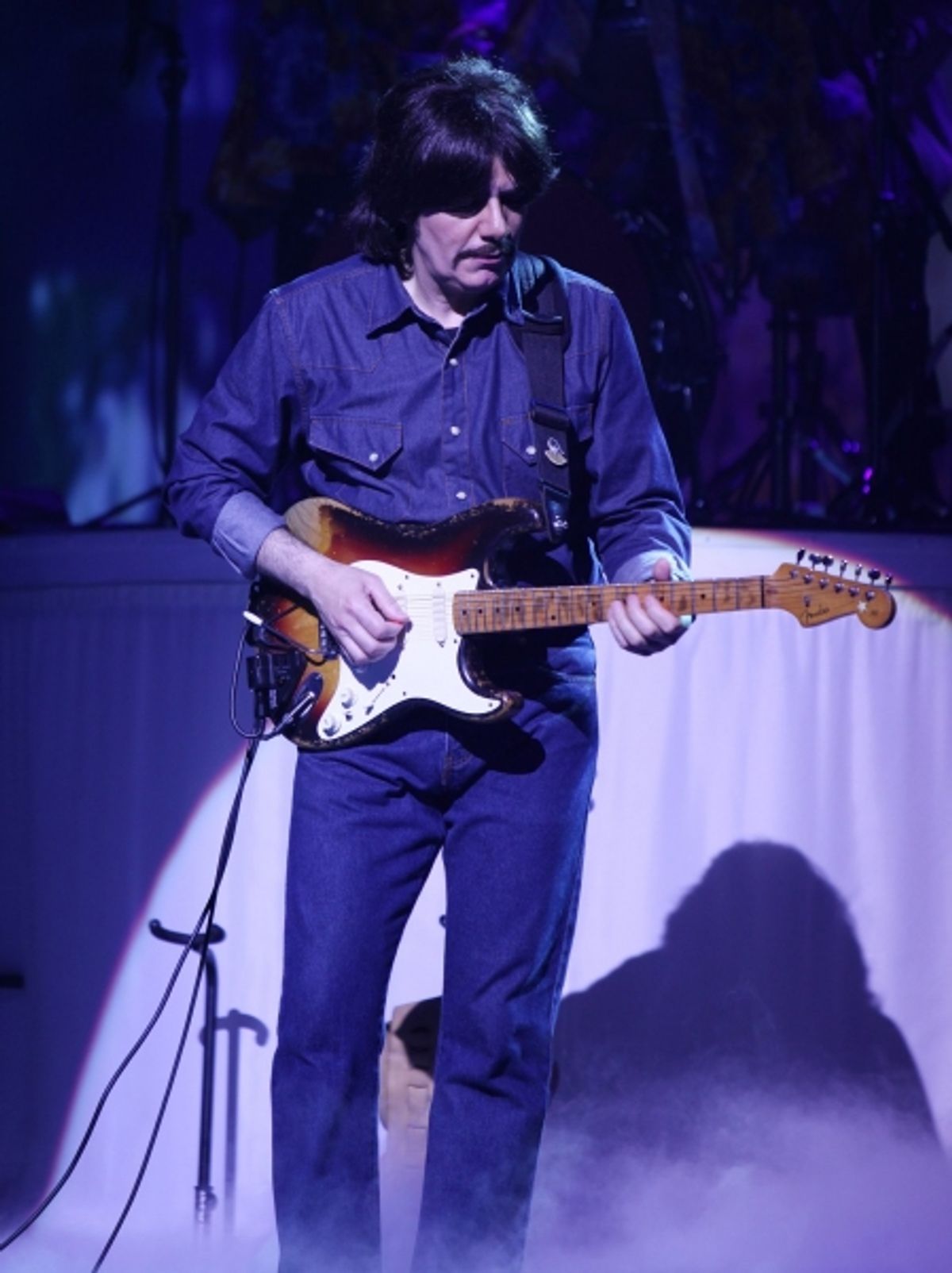 Joe Bithorn as George Harrison at 