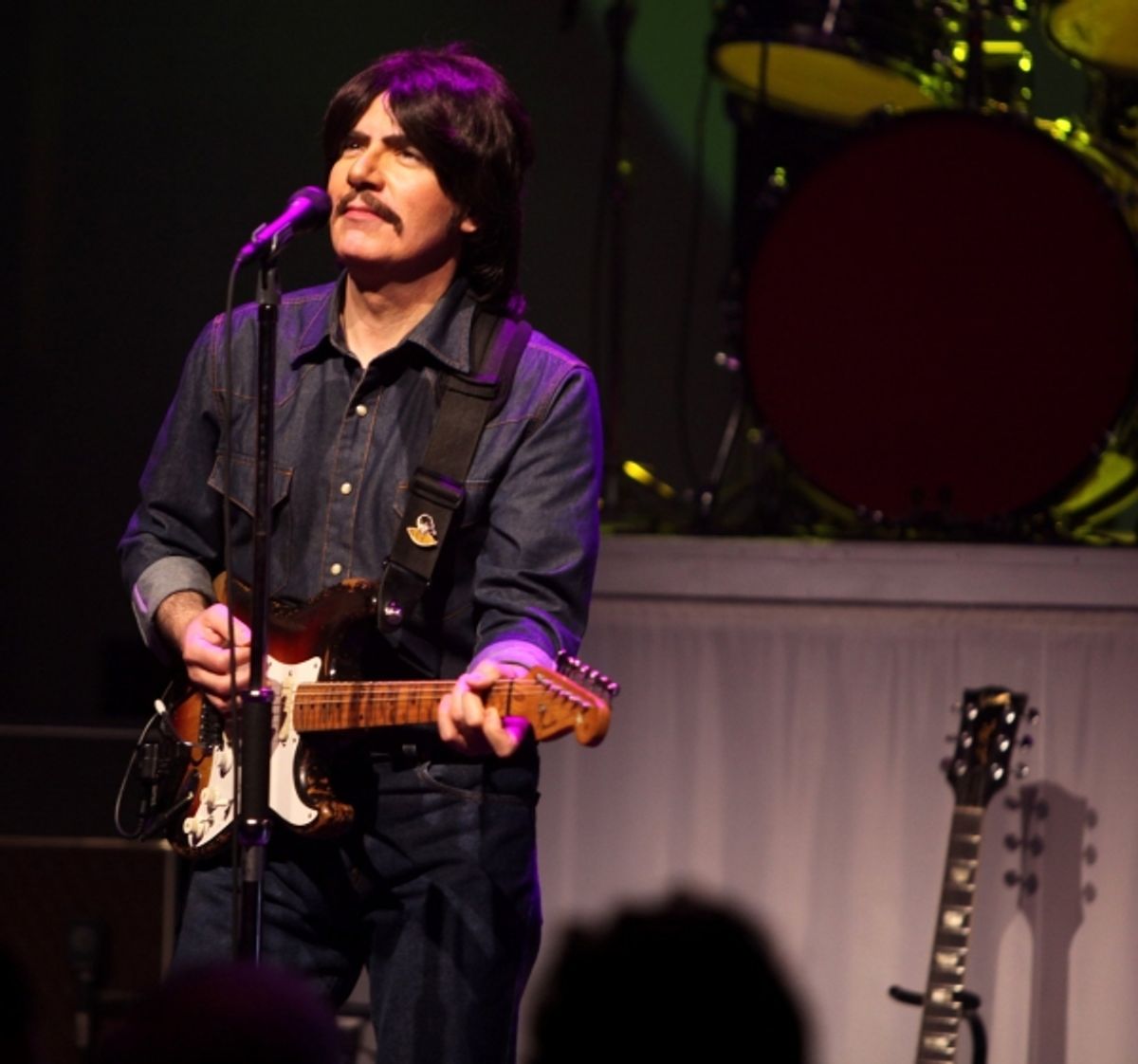 Joe Bithorn as George Harrison at 