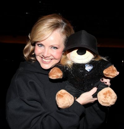 Susan Stroman poses with a bear in her likeness, a gift from Clinton Roane Photo