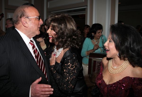 Clive Davis & Joan Collins Photo