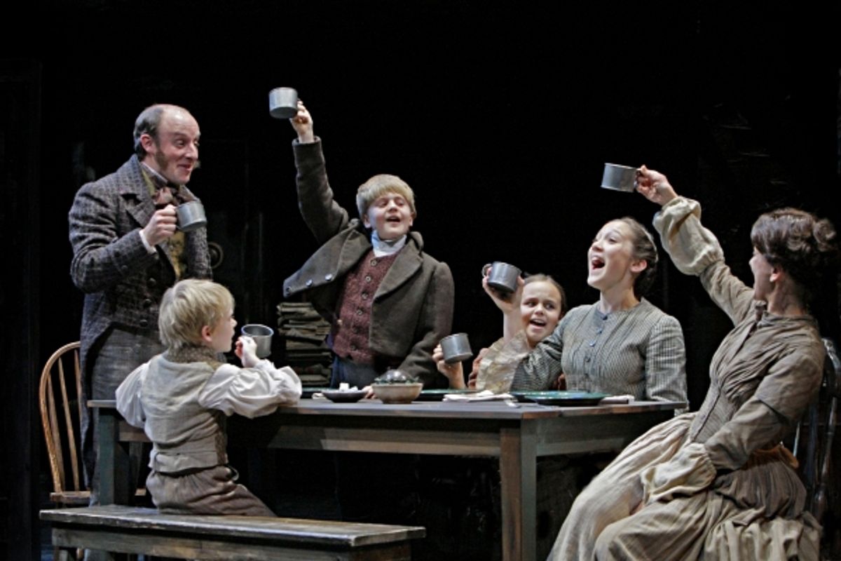Kris L. Nelson (Bob Cratchit), Noah Ross (Tiny Tim), Noah Coon (Peter Cratchit), Elizabeth McCormick (Belinda Cratchit), Kate Howell (Martha Cratchit) and Virginia S. Burke at 