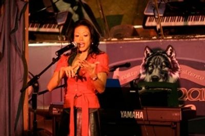 J Elaine Marcos starts off the evening Photo