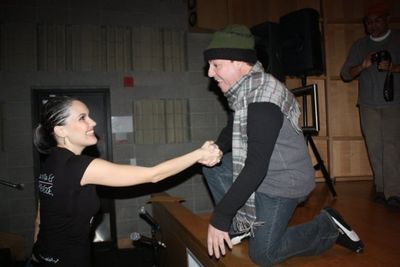 Lou Briel from Puerto Rico National TV says hello to Co-Executive Director Denisse Am Photo