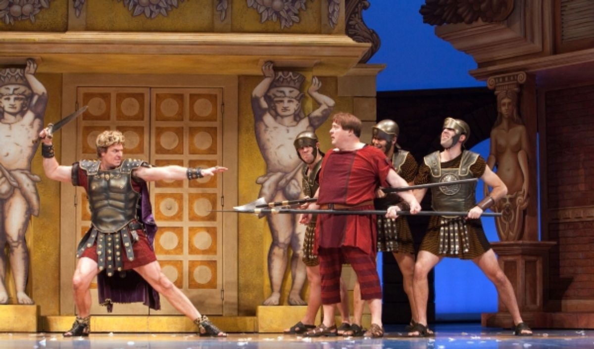 (Foreground, left to right) Dan Chameroy (Miles Gloriosus) and Sean Cullen (Pseudolus); (background) members of the ensemble at 