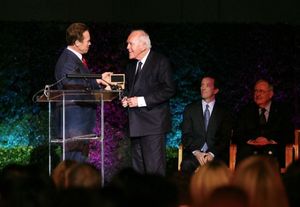 Former Govenor Arnold Schwartzenegger presents the official Govenors ring to Founding Chairman Henry Segerstrom @ BroadwayWorld Former Govenor Arnold Schwartzenegger presents the official Govenors ring to Founding Photo