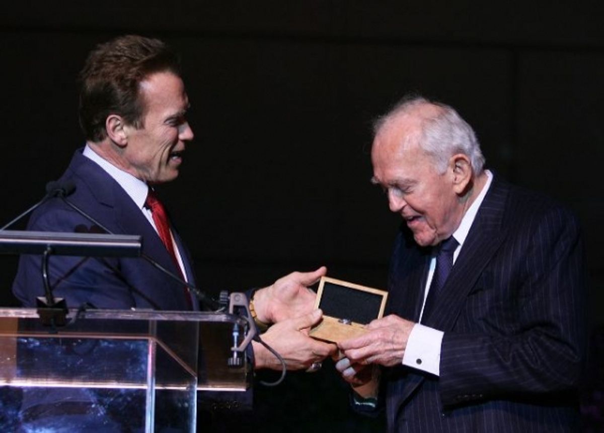 Former Govenor Arnold Schwartzenegger presents the official Govenors ring to Founding Chairman Henry Segerstrom  at 