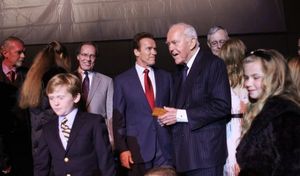 Arnold Schwartzenegger (L Center) presents the official Govenors ring to Founding Cha Photo