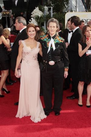 Emily Gerson and Temple Grandin pictured at the 68th Annual Golden Globe Awards held  Photo
