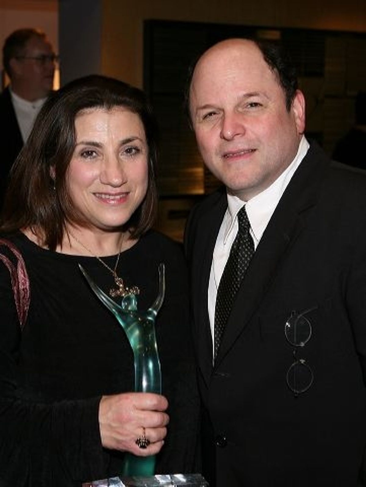 Lee Martino (L) poses with actor Jason Alexander at 