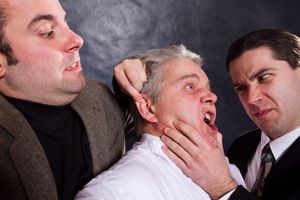 Sporty (Anthony Tournis), and the Commissioner (Eric Paskey) interrogate Bertozzzo (Vincent Lonergan, center) @ BroadwayWorld Sporty (Anthony Tournis), and the Commissioner (Eric Paskey) interrogate Bertozzzo (V Photo