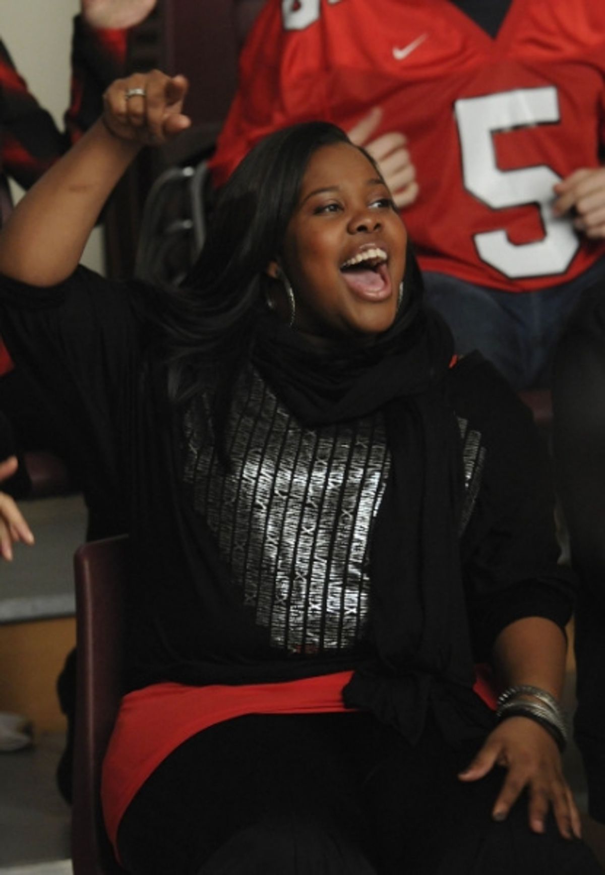 GLEE: Mercedes (Amber Riley) watches a performance in the 'Silly Love Songs' episode of GLEE airing Tuesday, Feb. 8 (8:00-9:00 PM ET/PT) on FOX. Ã‚Â©2011 Fox Broadcasting Co. CR: Michael Yarish/FOX at 