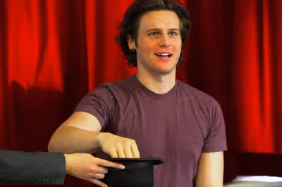 Jonathan Groff chooses a student to sing Photo