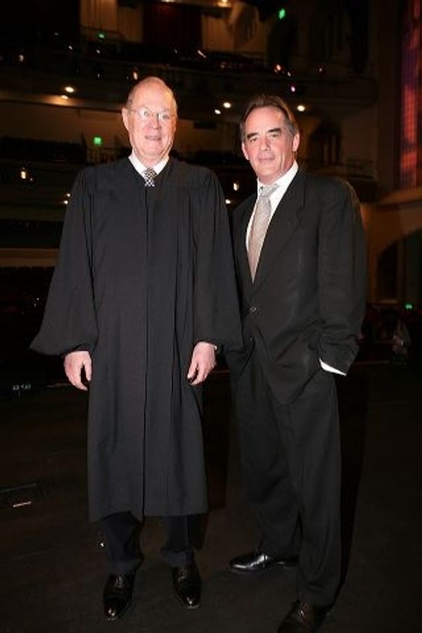 Supreme Court Justice Anthony M. Kennedy (L) and actor Tom Irwin Photo
