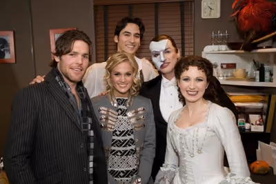 CARRIE UNDERWOOD and husband MIKE FISHER backstage at The Majestic Theatre with curre Photo