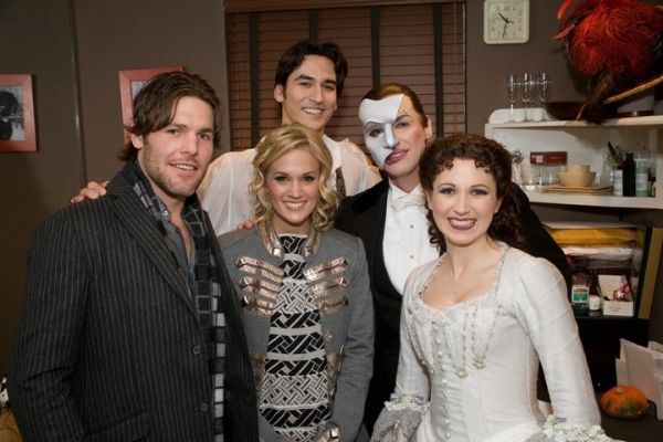 CARRIE UNDERWOOD and husband MIKE FISHER backstage at The Majestic Theatre with curre Photo