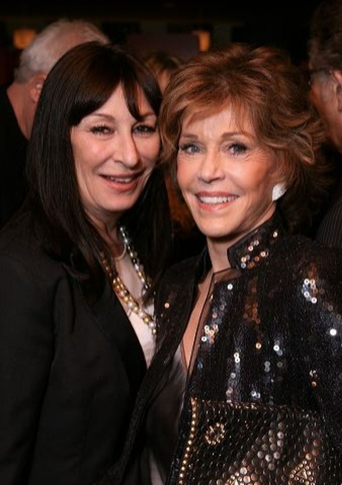 Anjelica Huston (L) and cast member Jane Fonda  at 