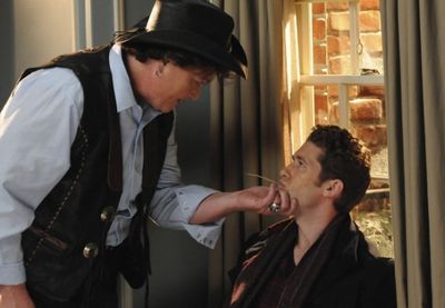 Coach Beiste (guest star Dot-Marie Jones, L) and Will (Matthew Morrison, R) have a he Photo