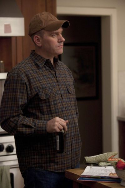 Burt (Mike O'Malley) tries to have a discussion with Kurt. Photo
