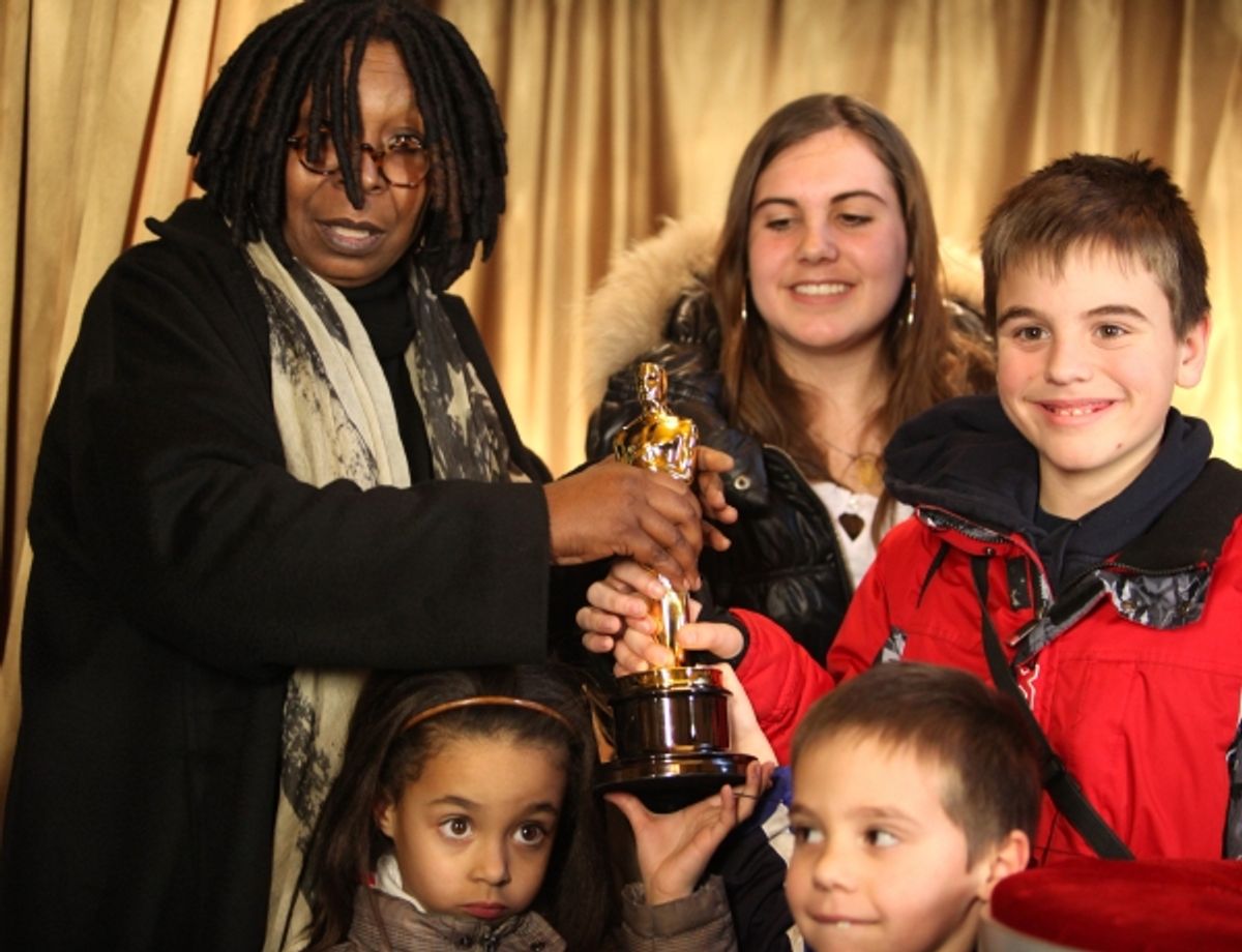 Meet The Oscars New York-Ribbon Cutting with Whoopi Goldberg at Vanderbilt Hall in Grand Central Terminal, New York City. pictured:  visitors at the Exhibit at 