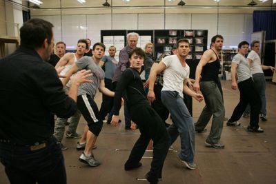 Daniel Radcliffe, John Larroquette and the company of How To Succeed Photo